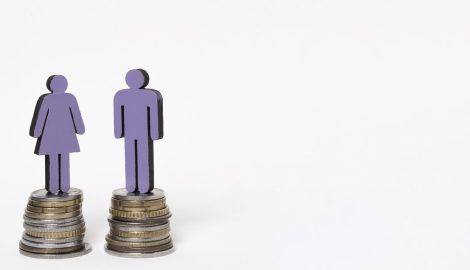 man-woman-standing-piles-coins